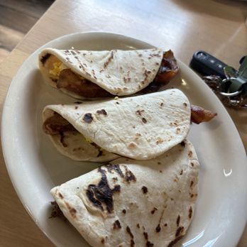 Tommy's Restaurant signature dishes Tommy's Burger, Steak Ala Mexicana Taco, El Macho Taco.